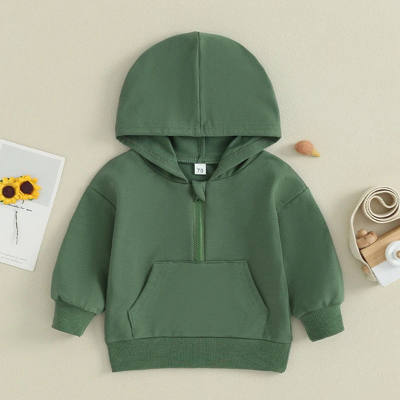 Introducing the Baby Hooded Sweatshirt, the perfect addition to your little one's wardrobe. Made with soft and comfortable fabric, this sweatshirt will keep your baby warm and cozy. The attached hood provides extra protection from the cold, making it a must-have for any outing. Crafted with your baby's comfort in mind, this sweatshirt is both stylish and practical.